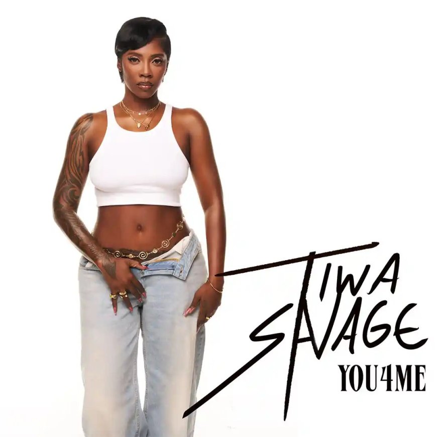African rapper number 1 M.i giving tiwa Savage her flower