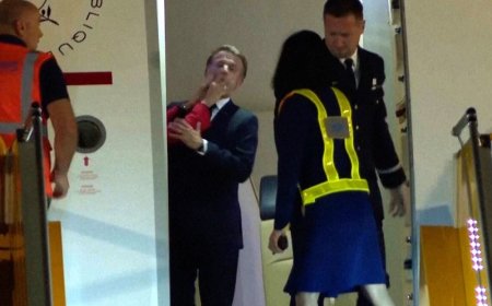 Brigitte Macron Nudging France President Emmanuel Macron’s Face