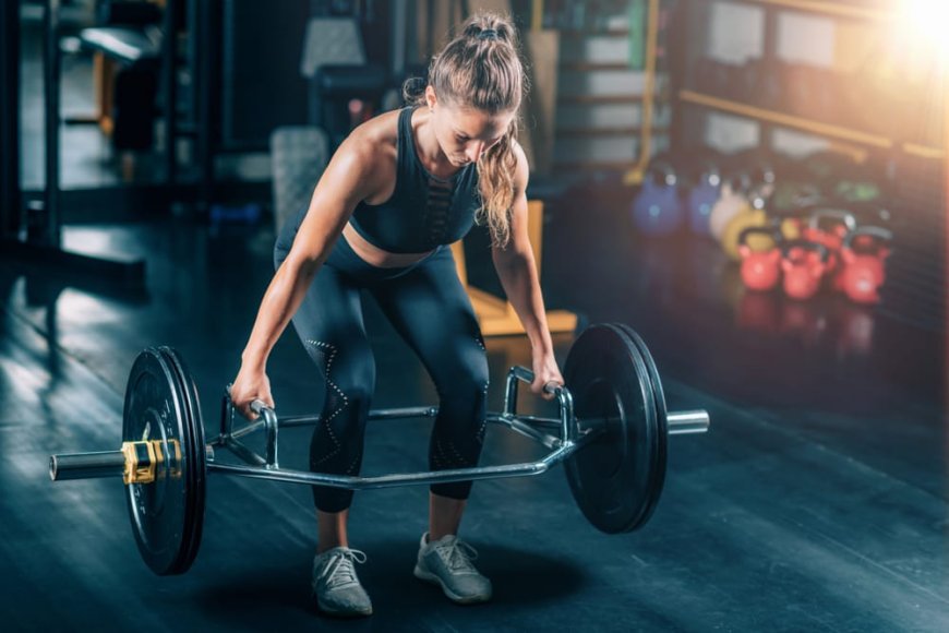 *Lifting heavy weights in the gym for women
