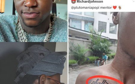 Shallipopi Left Speechless After Fan Tattoos His Name Across Chest   Shallipopi appeared stunned after a fan revealed a large tattoo of the artist’s name boldly inked on his chest. Instead of excitement, the singer’s reaction suggested surprise and disbelief at the extreme show of support.