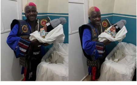 Portable flaunts his newborn baby online alongside his old belts