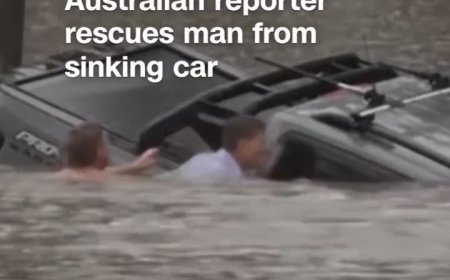 ABC Reporter and Bystander Rescue Man Moments Before Floodwaters Submerge His Car in Australia